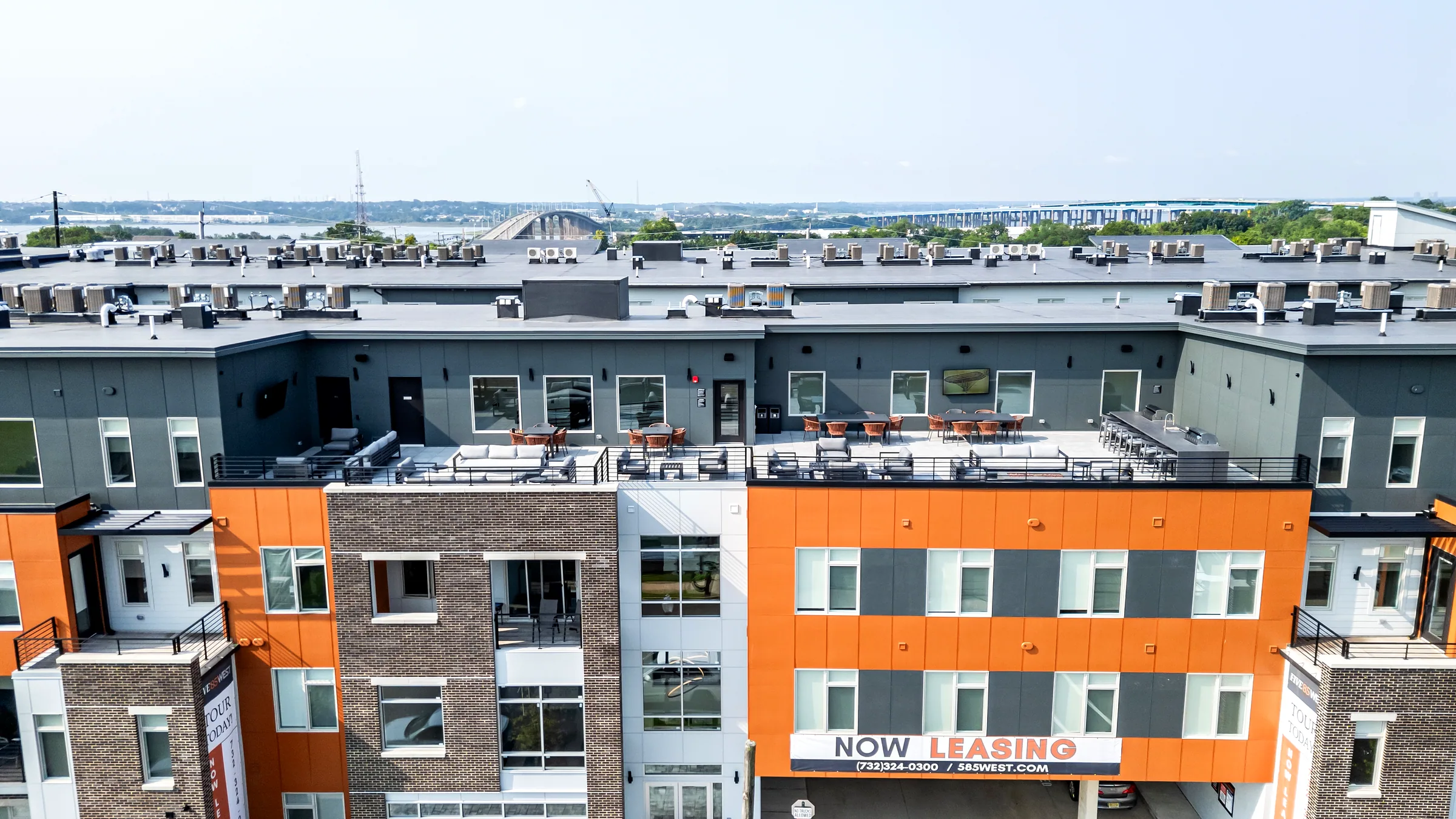 Aerial view of Five85West at 585 Sayre Avenue with Raritan Bay and the bridge on the horizon